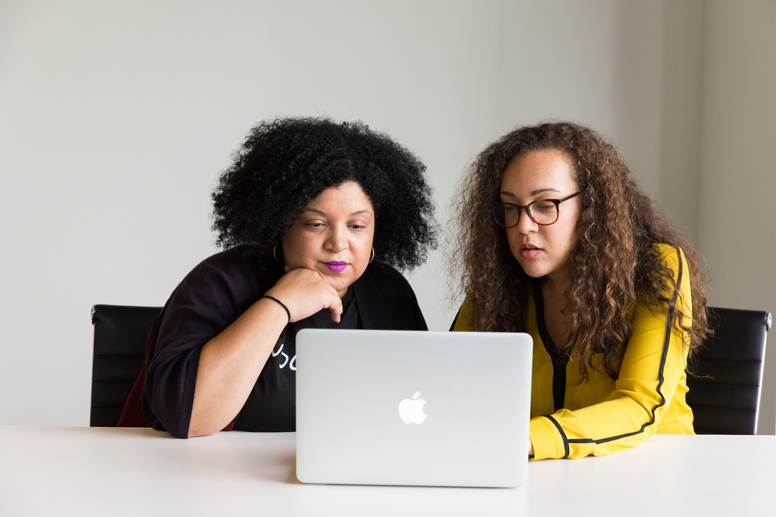 Photography of Women Using Laptop